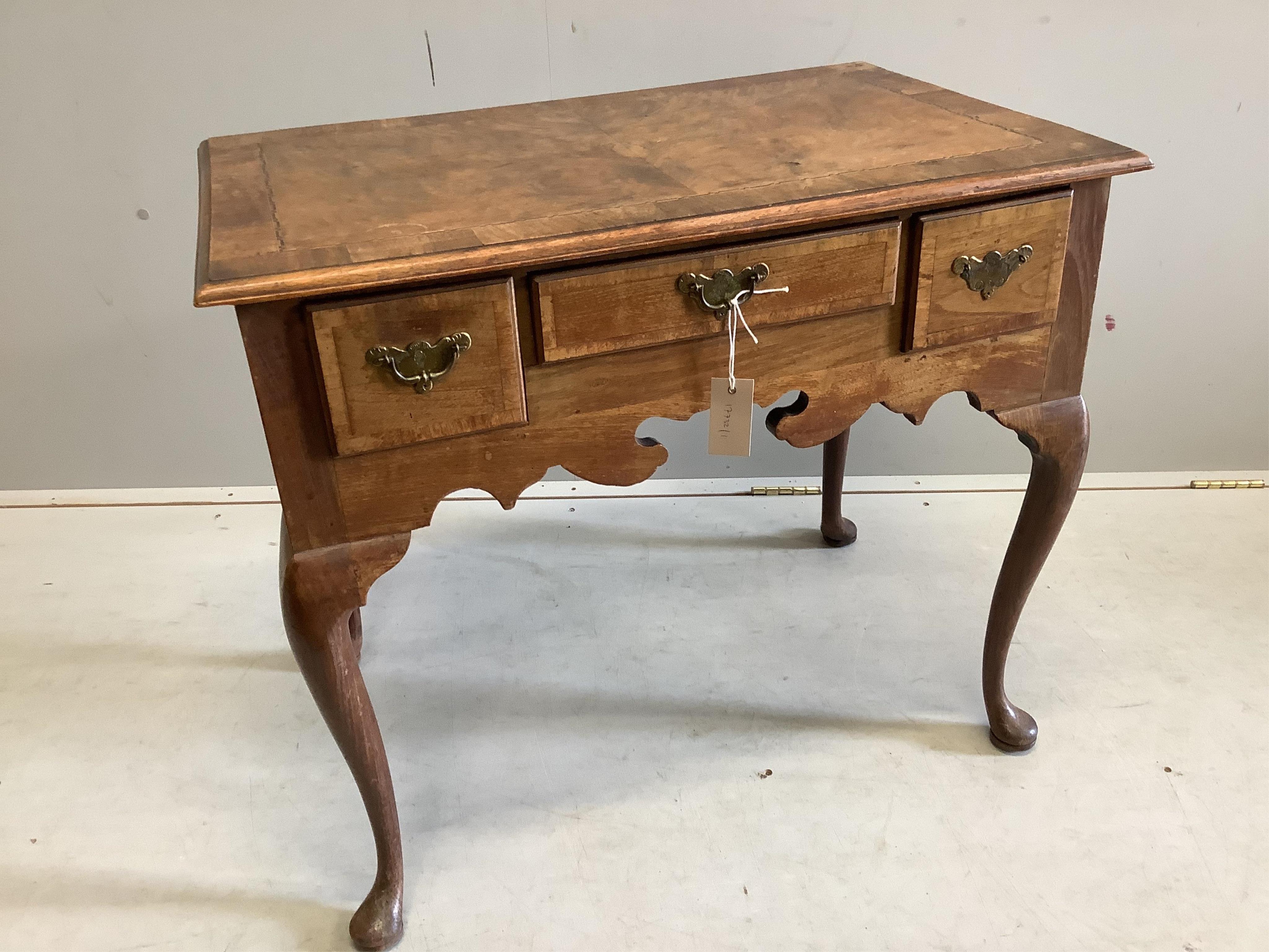 An 18th century inlaid walnut lowboy, width 77cm, depth 50cm, height 67cm. Condition - fair